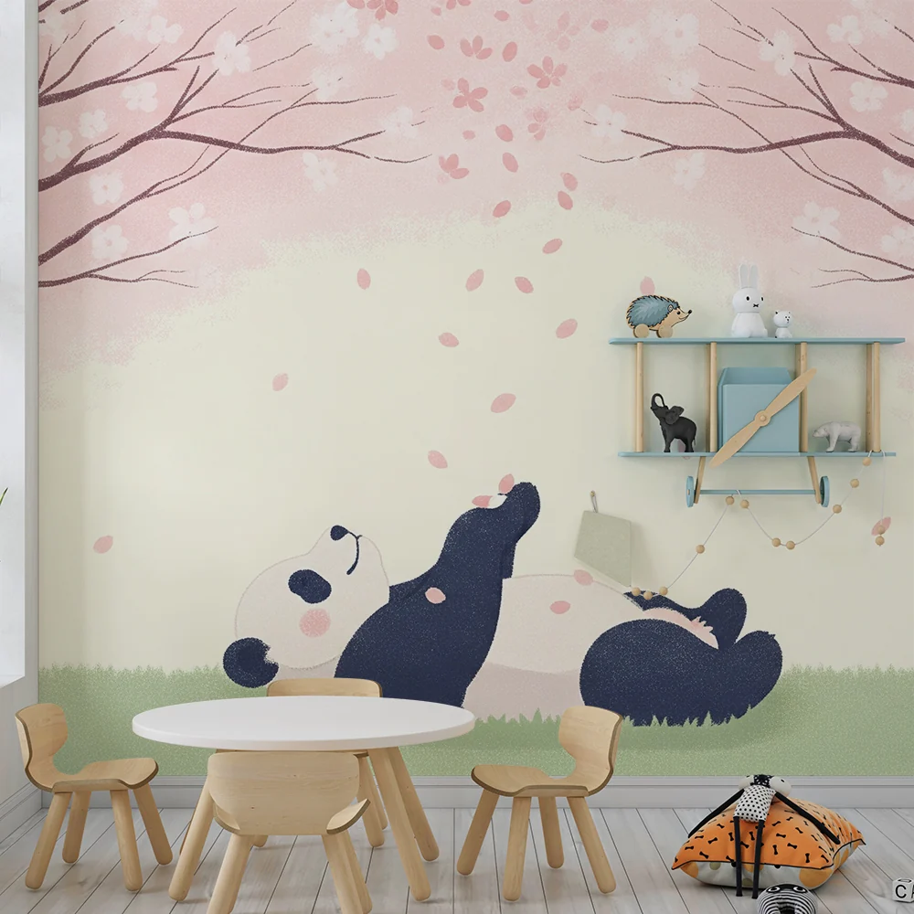 Tapet barnerom | Avslappende panda under blomstrende kirsebærtrær